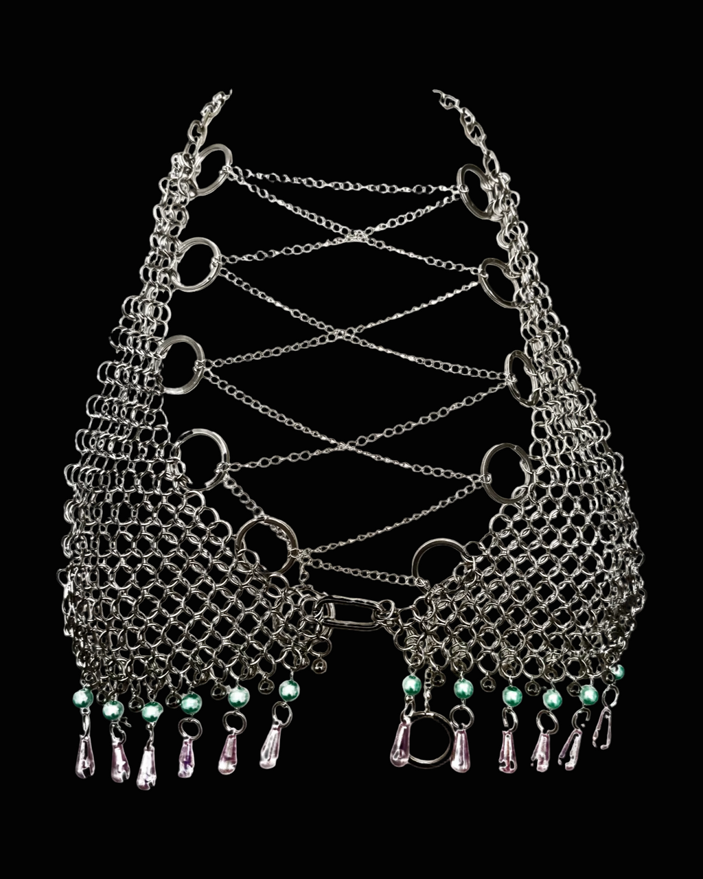 Metallic chainmaille bra with green beads on a black background SKNDLSS
