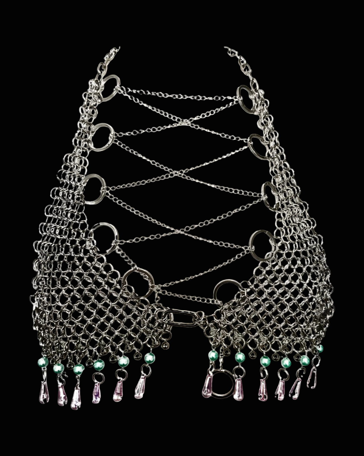 Metallic chainmaille bra with green beads on a black background SKNDLSS
